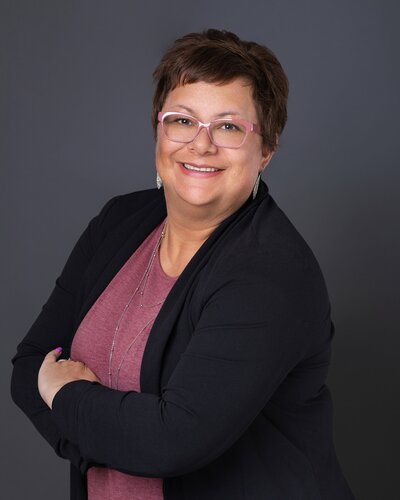Real estate professional headshot from Heather's portfolio.